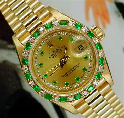 gold rolex emerald face|More.